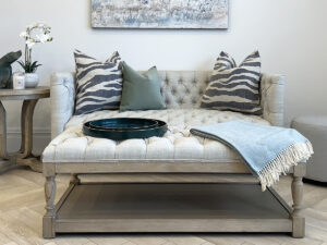 Astrid Deep Buttoned Coffee Table with Wooden Base in Porridge