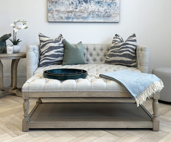 Astrid Deep Buttoned Coffee Table with Wooden Base in Porridge