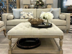 DISCONTINUED - Hugo Square Upholstered Coffee Table with Wooden Base in Porridge